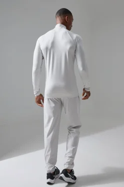 boohooMAN Active Training Dept Perforated Slim Fit 1/4 Zip Top | UK| Hoodies & Sweatshirts