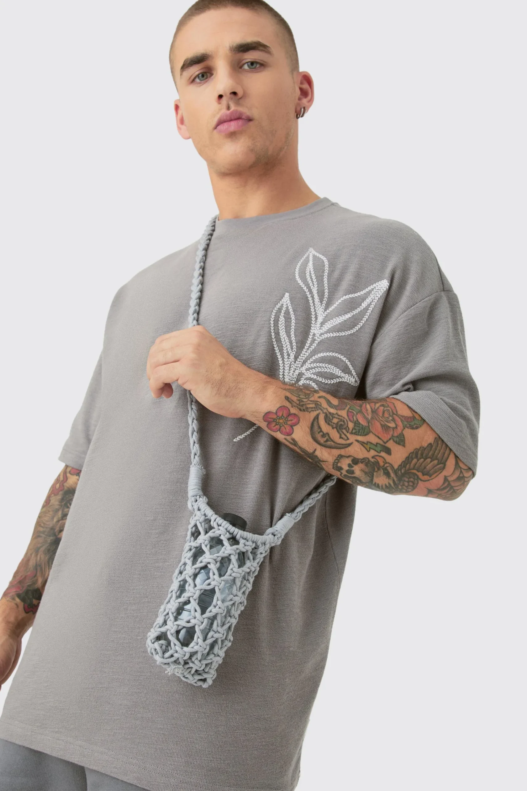 boohooMAN Crochet Bottle Bag In | UK| Bags & Wallets