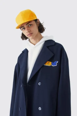 boohooMAN Double Breasted Longline Varsity Badge Overcoat | UK| Coats & Jackets