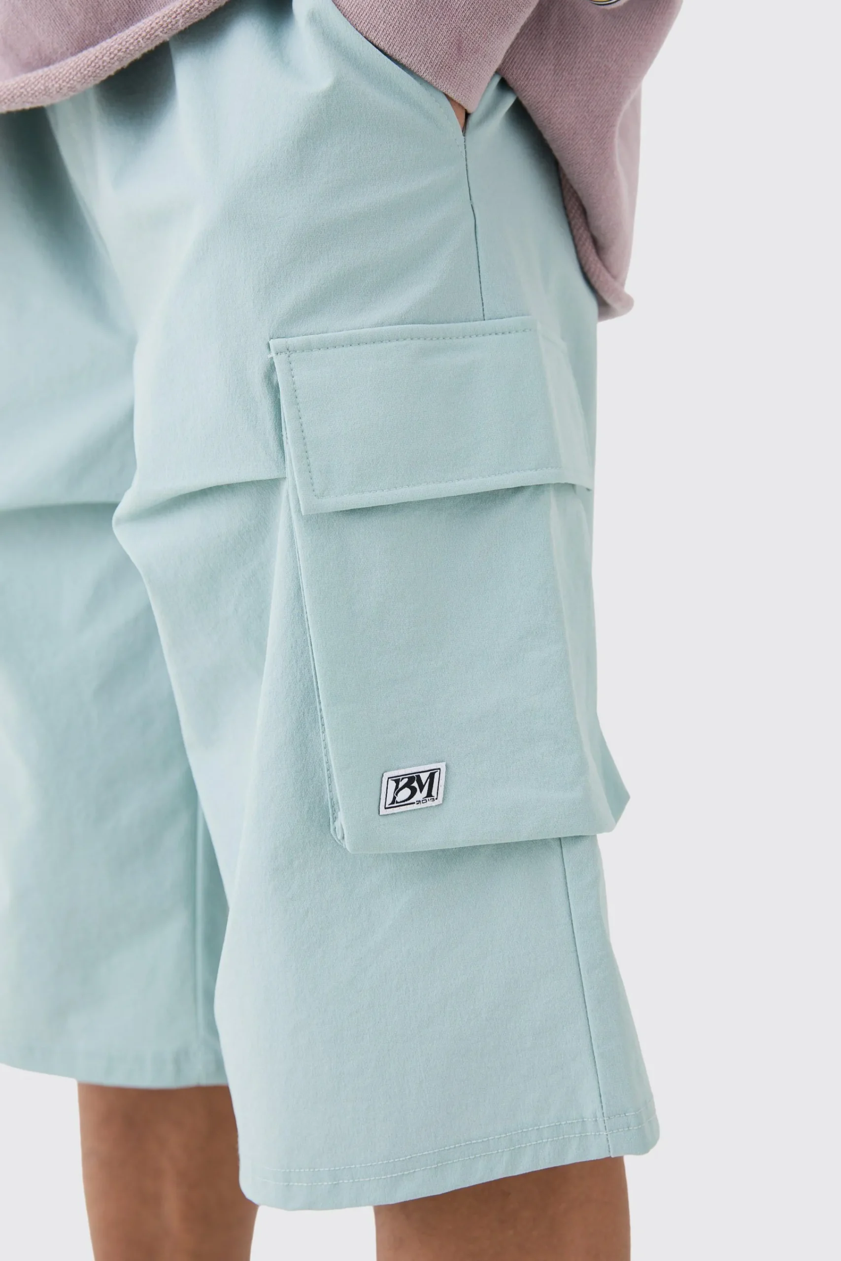 boohooMAN Elasticated Relaxed Technical Stretch Short With Branding | UK| Shorts