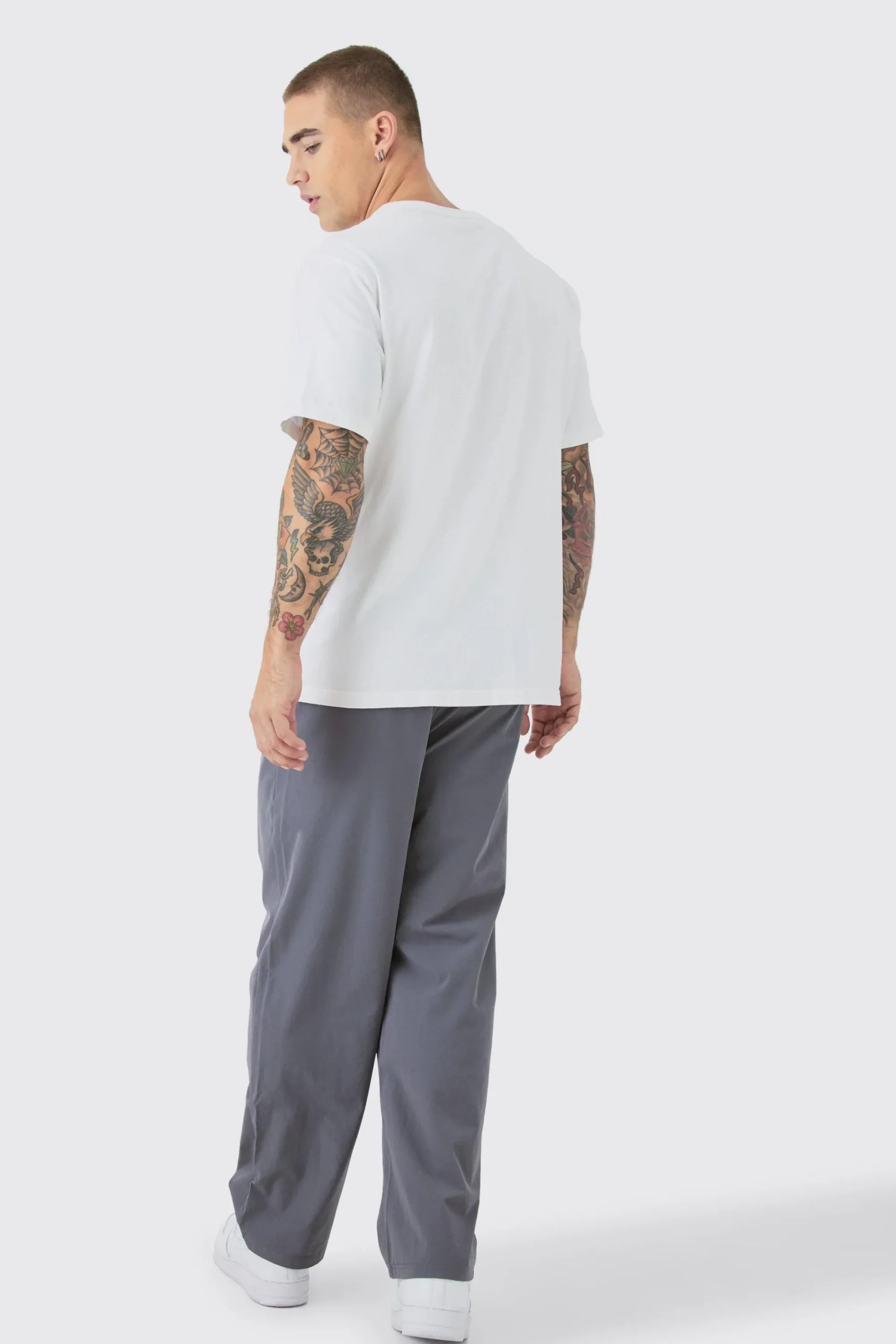 boohooMAN Elasticated Technical Stretch Relaxed Cropped Trouser | UK| Trousers