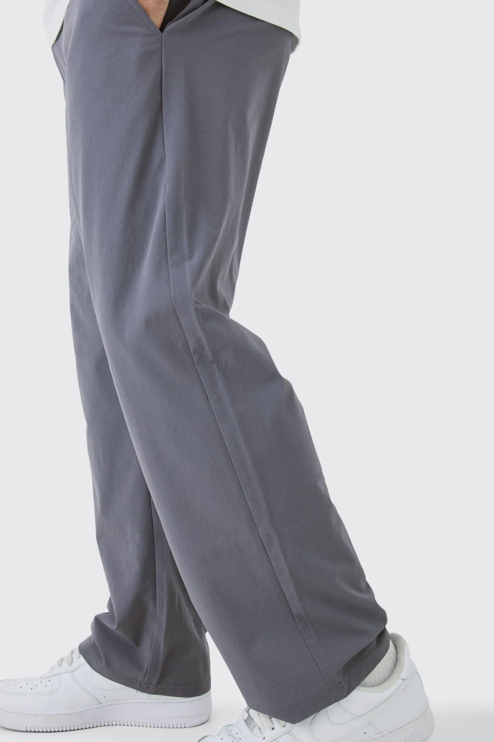 boohooMAN Elasticated Technical Stretch Relaxed Cropped Trouser | UK| Trousers