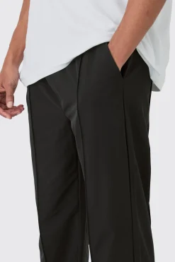 boohooMAN Elasticated Technical Stretch Relaxed Pintuck Trouser | UK| Trousers