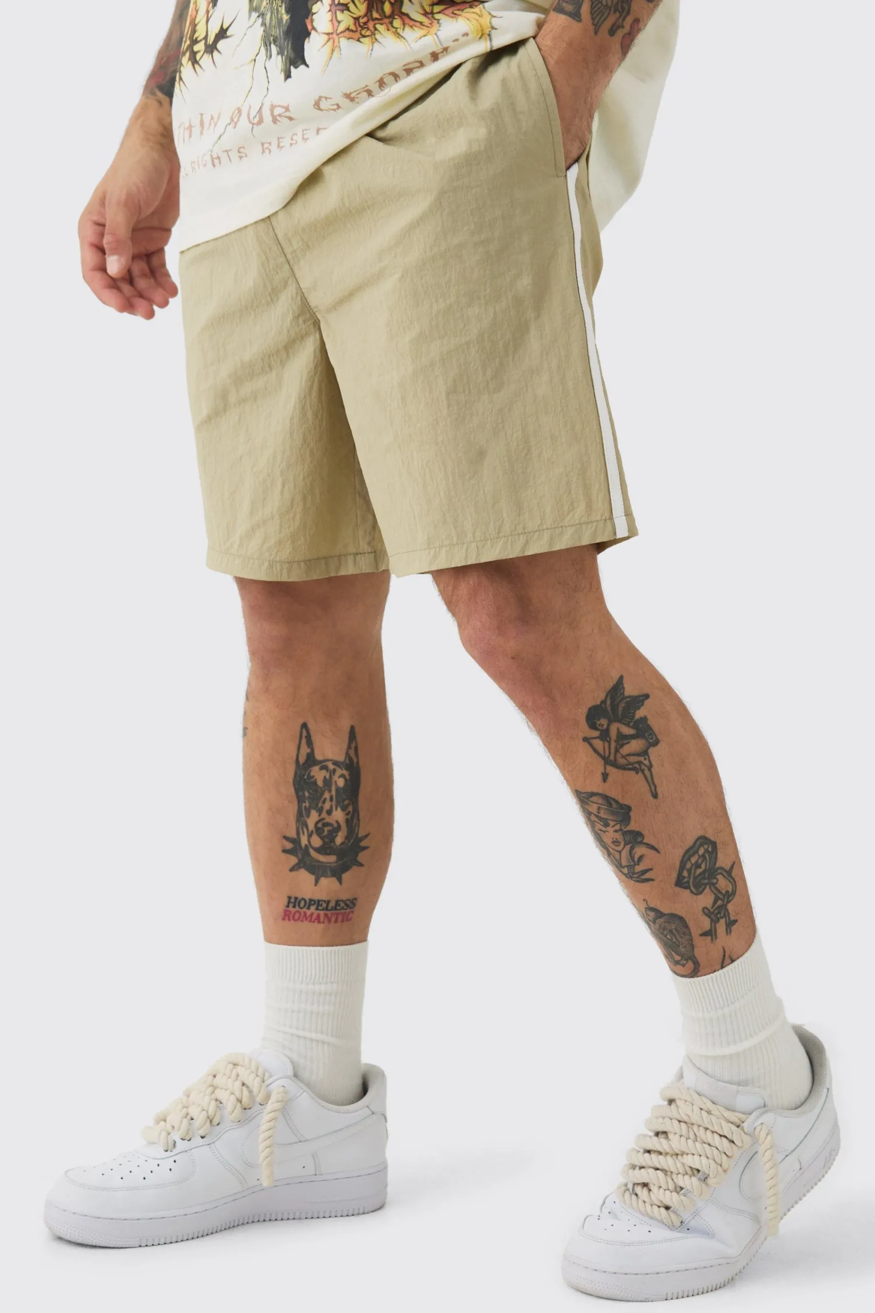 boohooMAN Elasticated Waist Side Piping Shell Shorts In | UK| Shorts