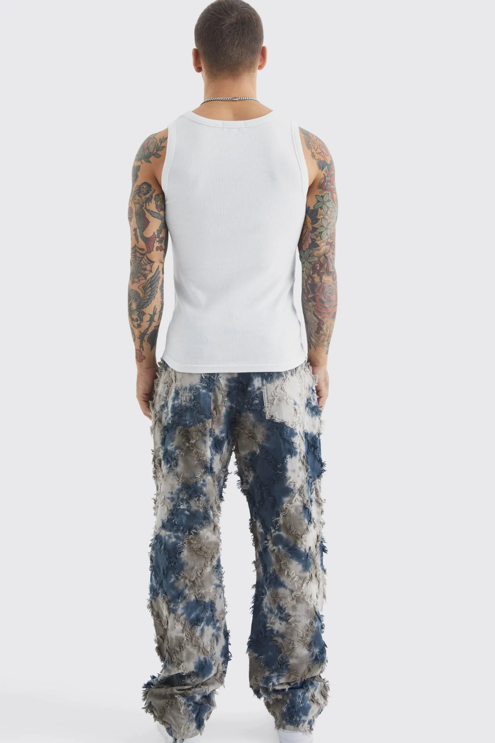 boohooMAN Fixed Waist Oil Camo Tapestry Trouser | UK| Trousers