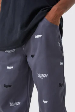 boohooMAN Fixed Waist Relaxed All Over Embroidery Trouser | UK| Trousers