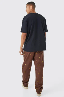 boohooMAN Fixed Waist Relaxed All Over Embroidery Trouser | UK| Trousers