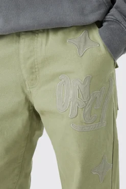 boohooMAN Fixed Waist Relaxed Gusset Applique Trouser | UK| Trousers