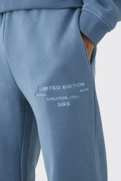 boohooMAN 330GSM Regular Fit Split Hem Jogger With Woven Badge | UK| Trousers|Joggers