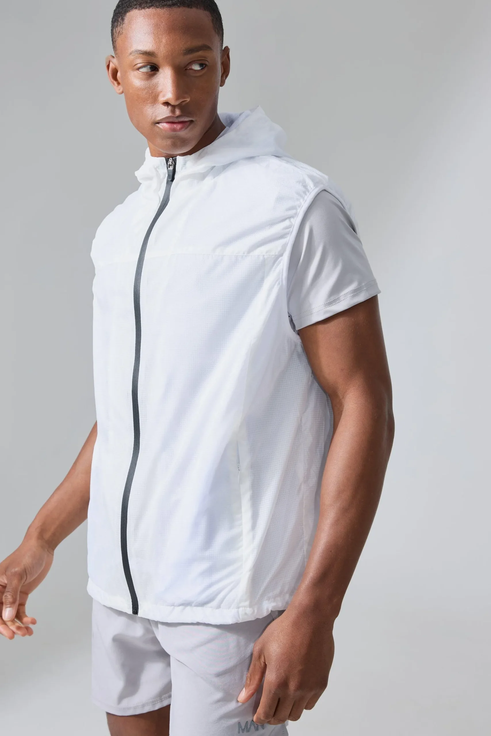 boohooMAN Man Active Mesh Lined Hooded Regular Fit Gilet | UK| Coats & Jackets