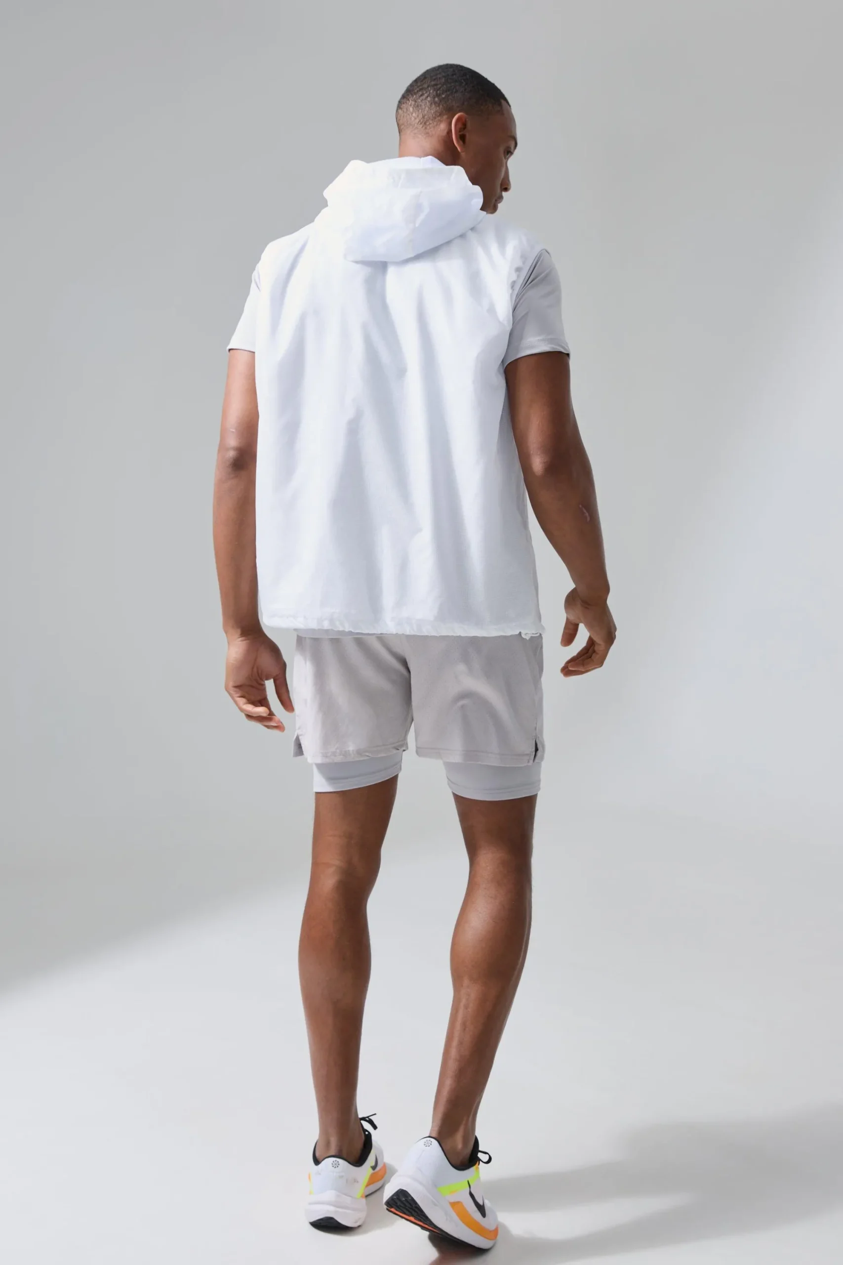 boohooMAN Man Active Mesh Lined Hooded Regular Fit Gilet | UK| Coats & Jackets