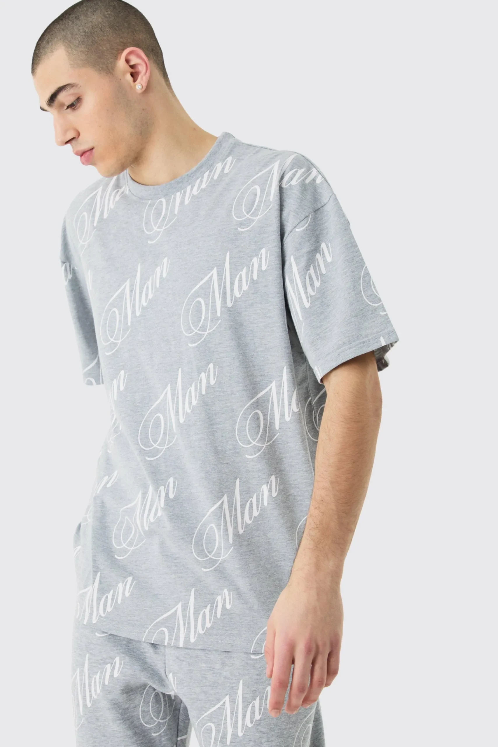 boohooMAN Man Script All Over Print Split Hem Tshirt & Jogger Set | UK| Sets & Co-Ords