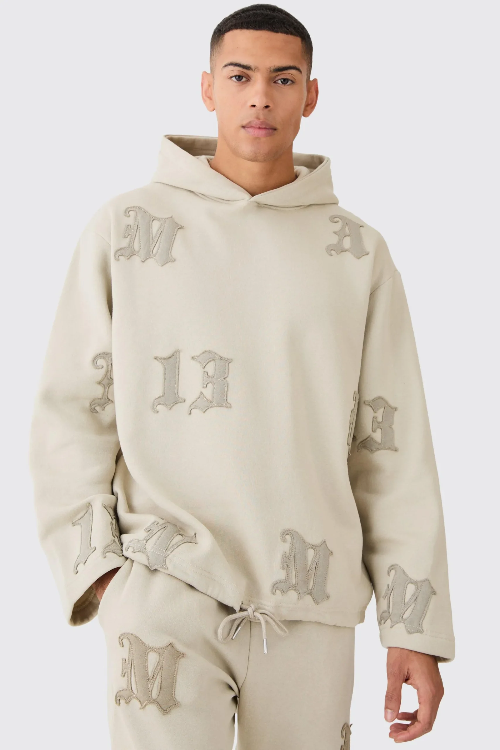 boohooMAN Oversized All Over Applique Open Hem Hoodie | UK| Hoodies & Sweatshirts