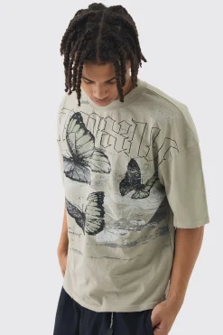 Oversized Boxy Butterfly Print Washed Raw Edge T-shirt | UK^boohooMAN Online