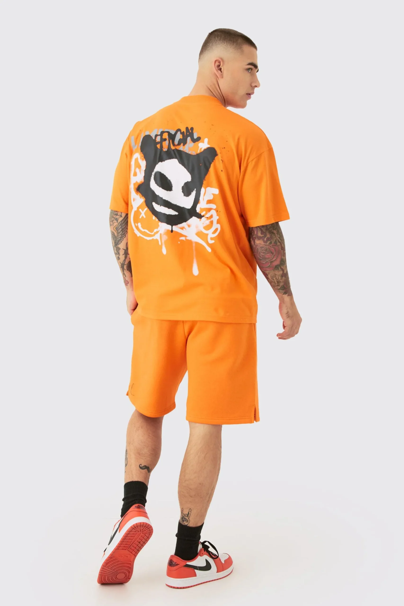 boohooMAN Oversized Extended Neck Graffiti T-shirt And Short Set | UK| Sets & Co-Ords|Tracksuits
