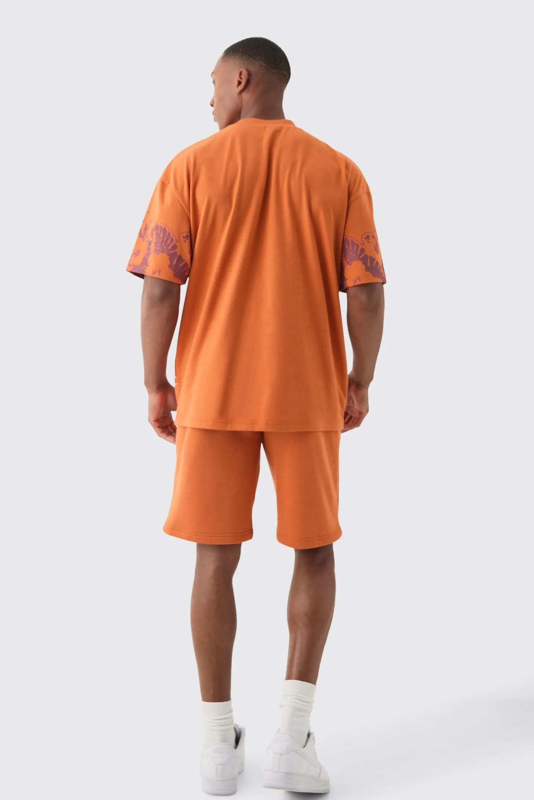 boohooMAN Oversized Extended Neck Worldwide Graphic T-shirt & Shorts Set | UK| Sets & Co-Ords|Tracksuits