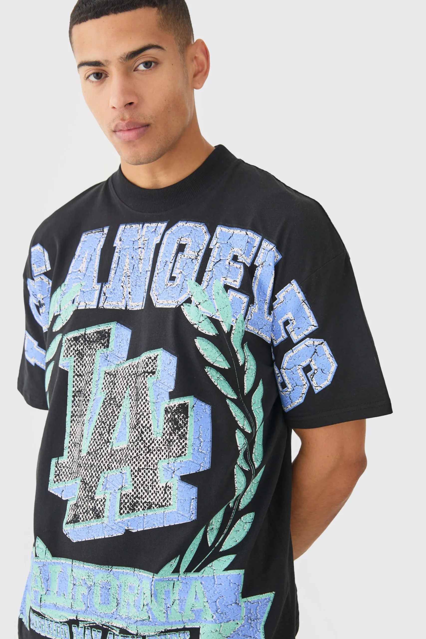 Oversized Over Seams Varsity LA Graphic T-shirt | UK^boohooMAN Online