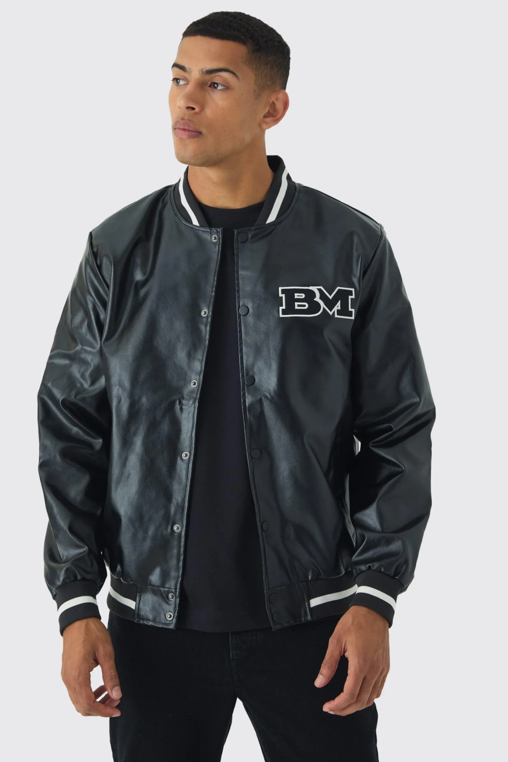 boohooMAN PU Badge Varsity Jacket In | UK| Coats & Jackets