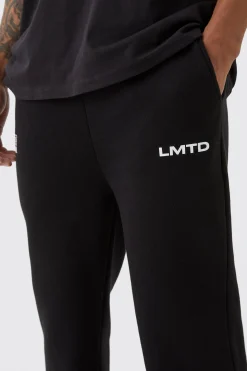 boohooMAN Relaxed Fit Flared Varsity Woven Tab Jogger | UK| Joggers