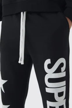 boohooMAN Slim Flared Stacked Superstar Puff Printed Joggers | UK| Trousers|Joggers