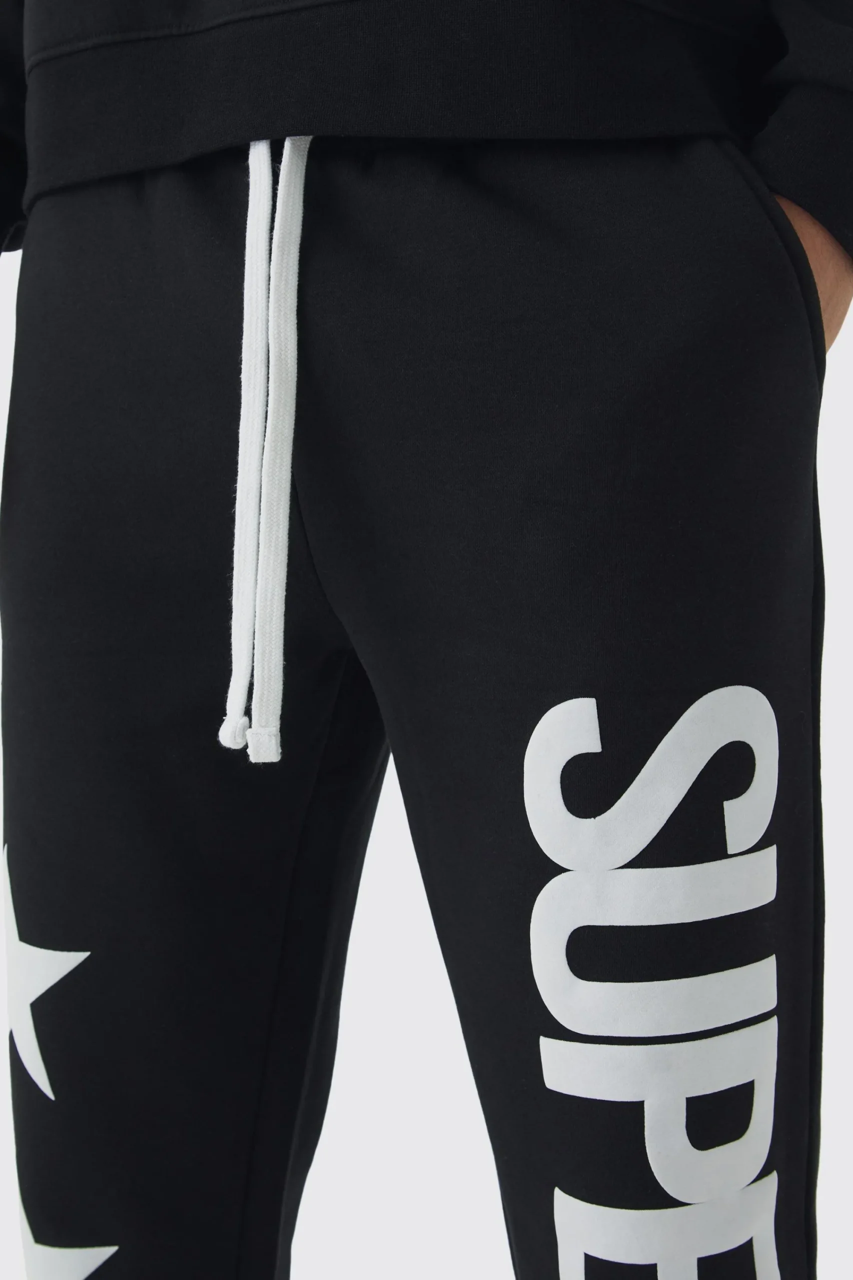 boohooMAN Slim Flared Stacked Superstar Puff Printed Joggers | UK| Trousers|Joggers