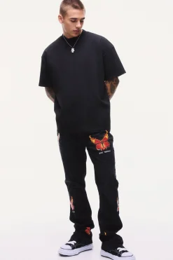 boohooMAN Slim Rigid Flare Popper Hem Graphic Butterfly Jeans | UK| Trousers|Jeans