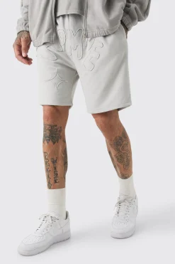 boohooMAN Tall Distressed Applique Loose Short In | UK| Shorts