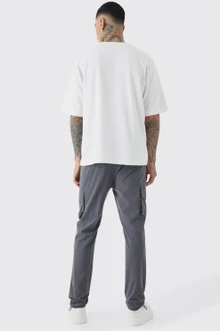 boohooMAN Tall Elasticated Lightweight Technical Stretch Skinny Cargo Trouser | UK| Trousers|Cargos