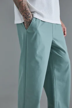 boohooMAN Tall Elasticated Waist Lightweight Technical Stretch Relaxed Trouser | UK| Trousers