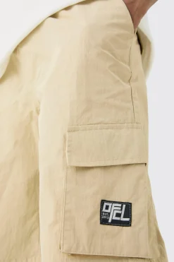 boohooMAN Tall Elasticated Waist Ofcl Nylon Cargo Short | UK| Shorts