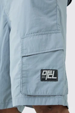 boohooMAN Tall Elasticated Waist Ofcl Nylon Cargo Short | UK| Shorts