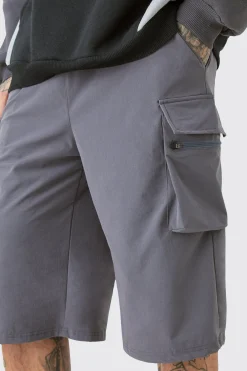 boohooMAN Tall Elasticated Waist Relaxed Lightweight Stretch Cargo Short | UK| Shorts