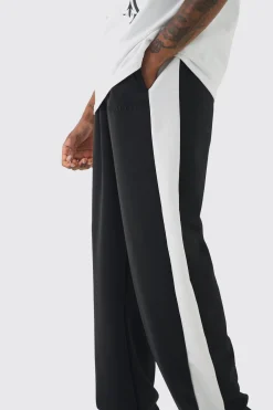 boohooMAN Tall Tricot Side Panel Embroidered Relaxed Fit Trousers | UK| Trousers|Joggers