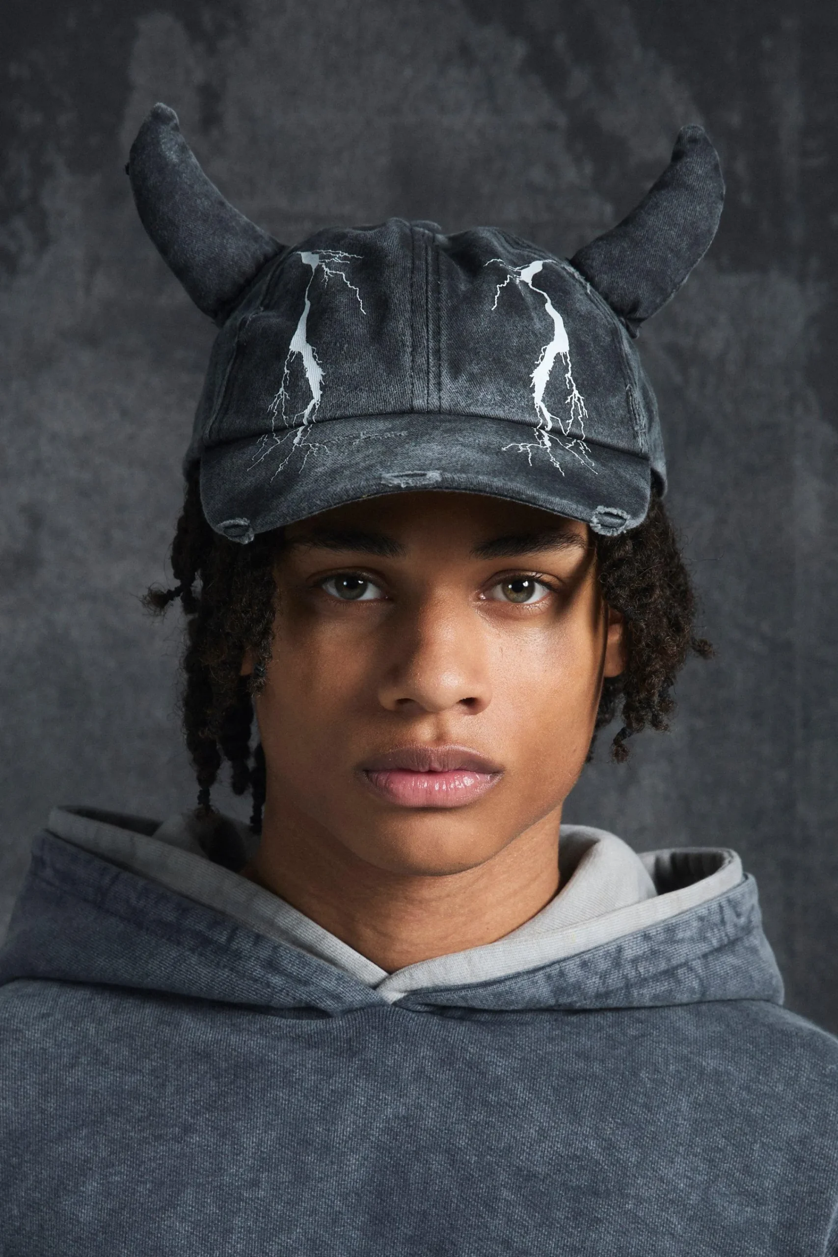 boohooMAN Trippie Redd Graphic Print Distressed Horn Cap In | UK| Hats & Caps