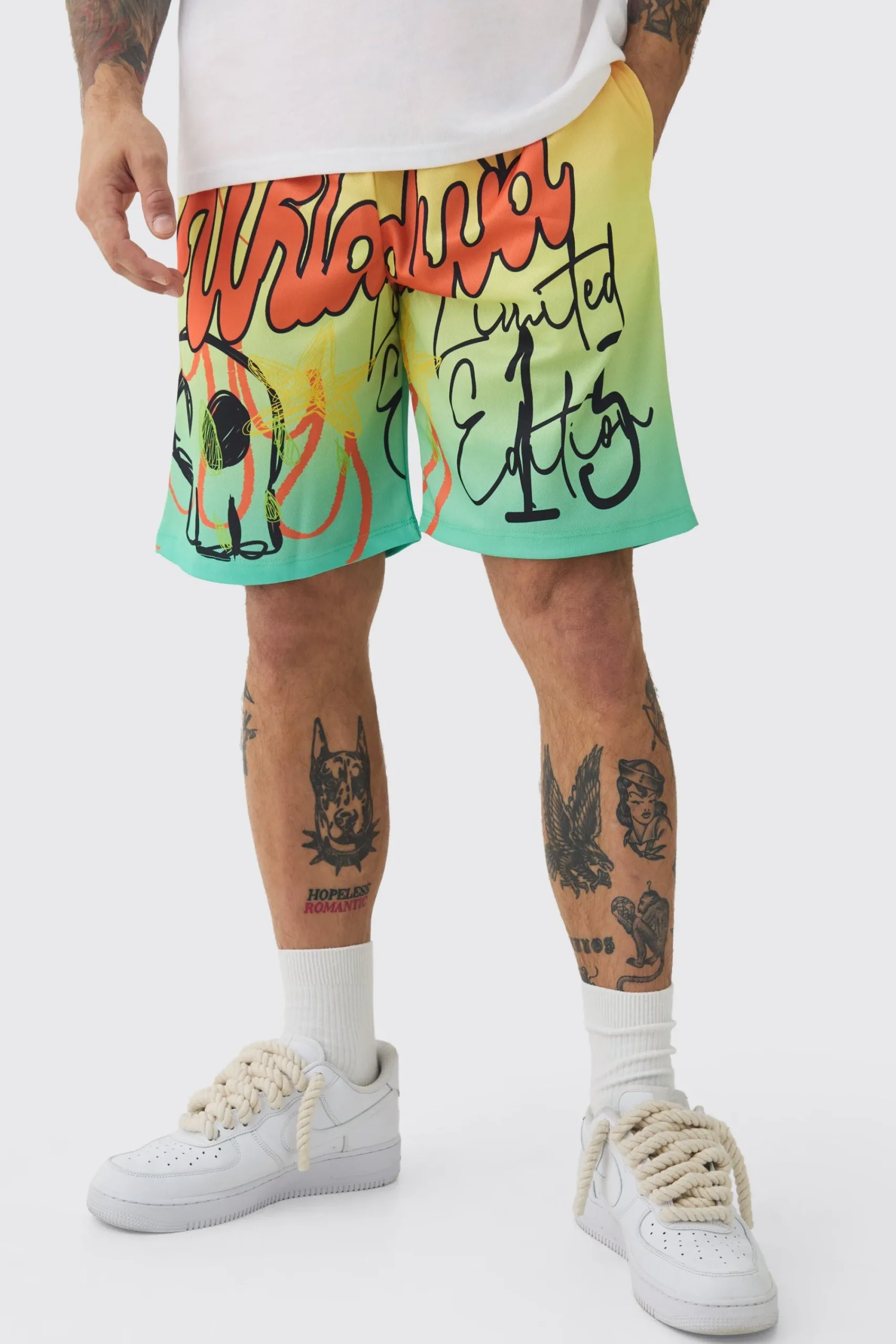 boohooMAN Worldwide Graffiti Mesh Mid Length Basketball Shorts | UK| Shorts